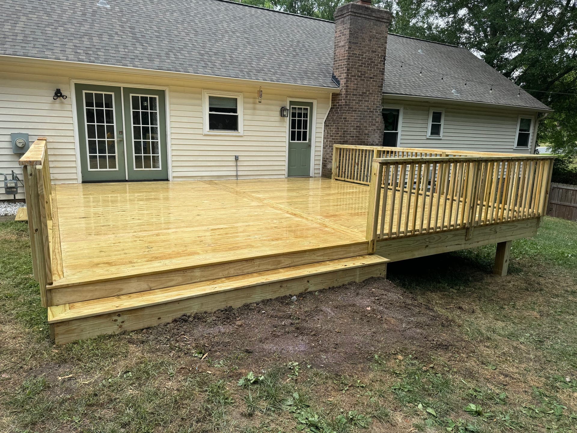 A beautiful backyard deck in Rock Hill, SC, showcasing different materials and styles.